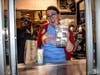 Hillcrest Teacher Rachel Pinkepank has a blast working the Drive-Thru Window at the Elgin McDonald's on  Larkin Avenue