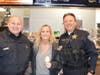 Cindy Schilling and Deputy Chief's Naydenoff and Winkelmann enjoy conversation at Cary McDonald's Cone with Cops event.