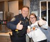 Cheyenne Glon was so happy to get a picture with Deputy Chief Winkelmann.