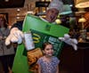 Sophia Hable was very excited to see Principal Puttin dressed as an apple pie during the Holy Cross McTeacher's Night fundraiser in Batavia