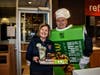 Holy Cross School Principal Mr. Puttin and Assistant principal Mrs. DeBlock sell Apple Pies during the school's FUNdraiser at the Batavia McDonald's