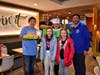 Students Hannah and Ava Blumhardt take a picture with Mr. Ham, Principal Pearce, Assistant Principal Aliano, and Mrs. Hamlink dressed as an Apple Pie
