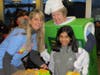 Saint Emily School Principal Amy DuMez, Junior High teacher Jane Gawlik and first-grader Evelyn Sunil were all smiles during the McTeacher's Night held on Thursday, January 30th at the Mt. Prospect McDonald's located on Rand Road.