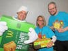 Oak Terrace Elementary School Principal Amy Cengel, Associate Principal Jeremy Wickham, and Teacher Greg Ward are ready to sell delicious apple pies during the Oak Terrace McTeacher's Night held on Wednesday, February 12th at the Highwood McDonald's.