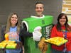 Gemini Middle School teachers Ashley Larrabee,Joanna Tsoukatos, and Assistant Principal Brian Gariti are ready to serve delicious apple pies to the students and families during the McTeacher's Night held on February 20th at the Niles McDonald's.
