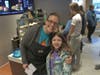 Dylan hanging outwith her favorite teacher at McTeacher's Night
