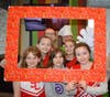 SaintChristina Cheerleaders: Lauren Susnis, Carrie Susnis, Kendal Schwarzer, MaryKate Dowdall, Delaney Serio, and Megan Murphy have a blast seeing teacher Danner in a Pie Box at McTeacher's Night.