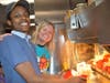 Tracy McDermott works hard preparing fries with McDonald's Staff 