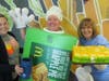 Cumberland Elementary School staff members Sue Duffy and Gary Niemiec along with Principal Colleen White danced and sang during McTeacher's Night selling delicious apple pies.