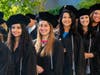 Graduates from the College of Health Sciences take part in a commencement ceremony at Midwestern University on August 29, 2019.