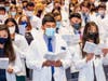 Students on the Downers Grove Campus participate in a White Coat Ceremony.