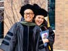 College of Pharmacy graduates Kevin Bueno of Romeoville, IL, and Kristin Kennedy of Lansing, IL, celebrate their graduation on the Downers Grove Campus of Midwestern University.