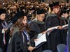 Graduates from Midwestern University’s College of Pharmacy, Downers Grove read the Oath of a Pharmacist during their commencement ceremony on March 2, 2023.