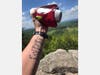 With names of friends who have died from ALS on his arm, Brian Duffy, event founder, ran Sawnee Mtn.