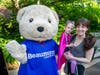 4-year-old Grace Parkinson and her mother Mary Parkinson of Rochester with Super Beau, the Beaumont Children’s mascot.