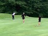 Sarrazin putting for eagle on hole 18.
