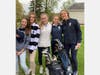 In 2019, freshmen Claire Gordy (white vest) and Lizzie Kuehndorf (next right in blue) were varsity starters every match.