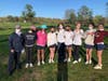 Coach Liz Fry, Cammie Rubino, Sienna Peck, Ellery Vishno, Elle Laub, Amanda Green, Lila Botur, Chelsea Cuseo and Viola Geismann masked up after victory.