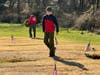 Scout Colby Wekler does a quality-control walk searching for the 365 veterans buried at Assumption. 