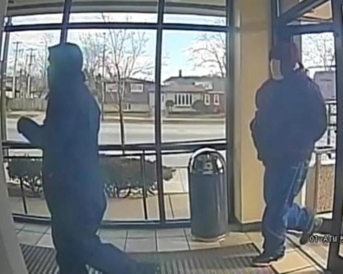 Surveillance images of two men who allegedly robbed a US Bank Branch in Chicago on March 5, 2019.