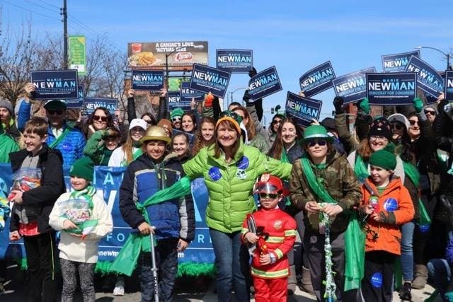Marie Newman (center in light green jacket) with supporters during her 2018 primary campaign. 
