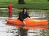 A kayak was the preferred mode of transportation in Oak Lawn on Memorial Day. 