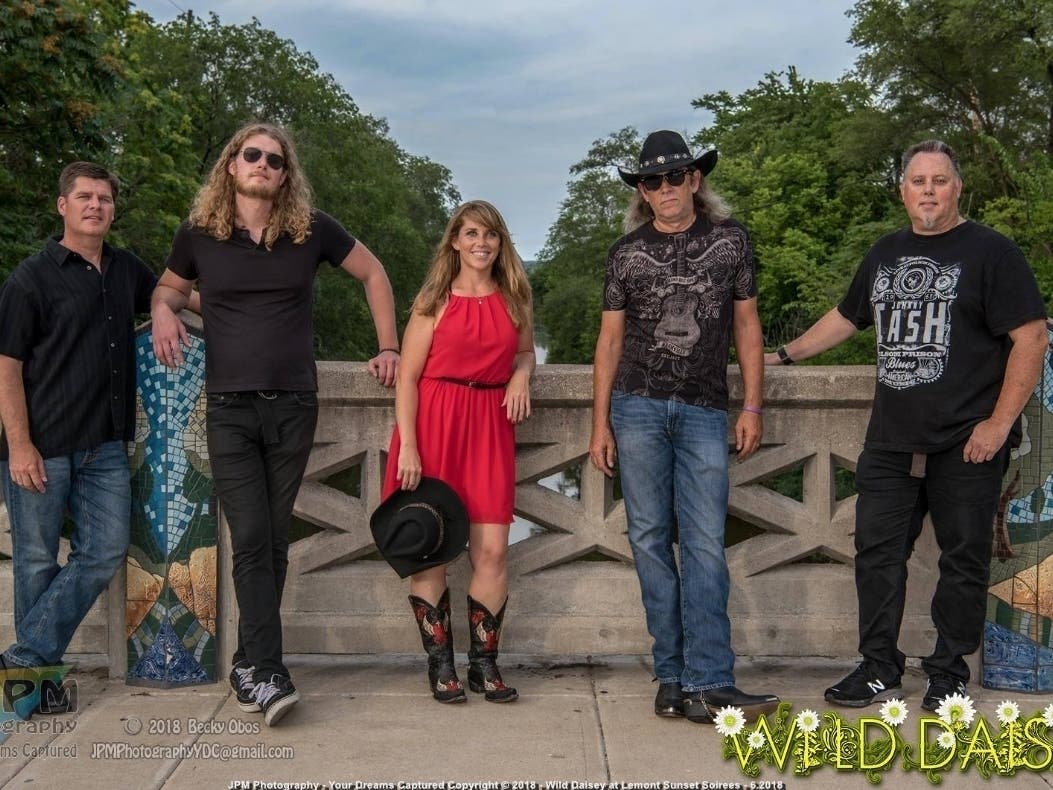 Wild Daisy bring their dynamic country and western show to Oak Lawn's Village Green on June 30.