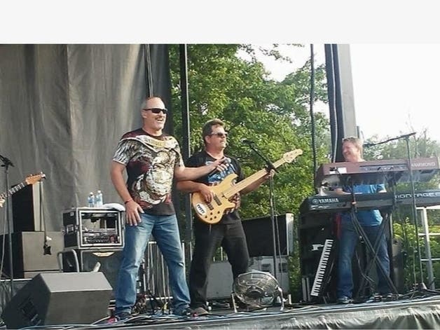 Five Guys Named Moe will play a free summer concert Sunday, July 21, on Oak Lawn's Village Green. 