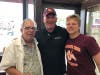 Br. Rice High School football coach Brian Badke and son Mick stopped by to wish Joe Scozio well on his retirement. 