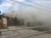 Oak Lawn firefighters fought a detached garage fire on July 4, where a firefighter became overcome by the heat. 