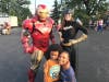 Super heroes from Suburban Party Characters greeted returning students.