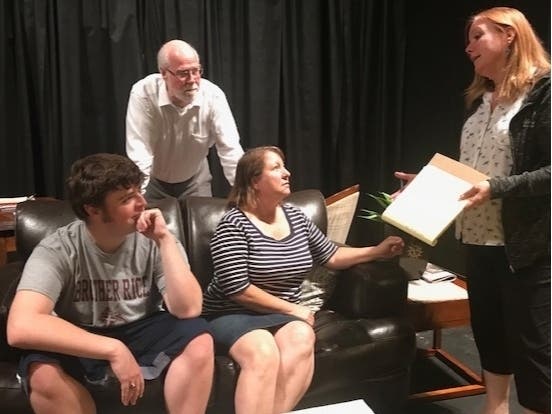 Director Cathi Diamond (far right) gives performance notes to Tom Jakubczak and Suzanne Noonan (seated) and Kevin Denny (behind couch)  during a rehearsal for the upcoming production of "Ordinary People."