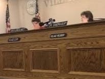Oak Lawn Mayor Sandra Bury (right) presides over a special board meeting on Oct. 14 to determine disciplinary action against Village Manager Larry Deetjen who is accused of leaving the scene of an accident. 