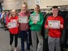 St. Catherine students earned certificates of appreciation and community service hours for confirmation. 