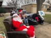 Santa hangs out on Tom Repetny's driveway in Oak Lawn. 