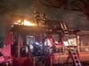 Four adults and two dogs escaped are safe after a fire tore through their hone early Saturday morning. 
