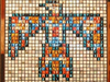 Award-winning Chicago artist Jennifer McNulty's "More Influence" exhibit, featuring her iconic 3D mosaics, runs Feb.  12 to March 6 at Saint Xavier University.  