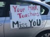 Teachers from Most Holy Redeemer School decorated their cars and visited the homes of all their students.
