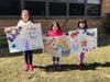 These young Raiders from Most Holy Redeemer were happy to visit their teachers from a safe distance. 