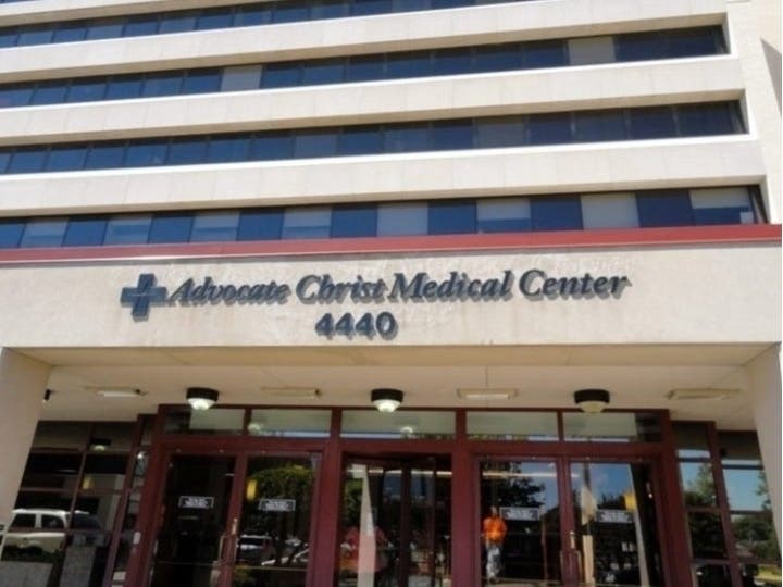 An Evergreen Park woman is believed to have jumped off a parking tower at Advocate Christ Medical Center.