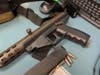 A loaded Intratec TEC 9 firearm was found at the scene where a police said an Alsip man was holding his girlfriend against her will. 