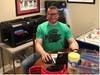 Oak Lawn Community High School teacher Dan Kenny has converted part of his home into a 3D printing lab to make PPE for frontline medical workers. 