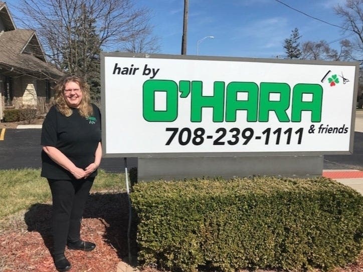 Cathy O'Hara in a 2018 photo in front of her salon O'Hara and Friends in Palos Heights. 