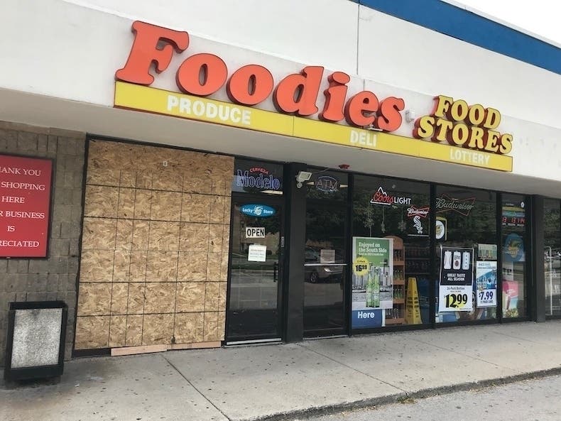 Two men are accused of breaking the windows and grabbing stuff from Foodie's Food Store in Oak Lawn. 