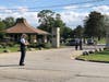 Chicago police investigate a shooting that took place during a funeral procession at Mount Hope Cemetery. 