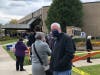 Voters line up in Oak Lawn for first day of early voting in suburban Cook County. 