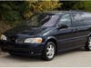 A blue Oldsmobile minivan similar to the one sought in connection to Amber Alert. 