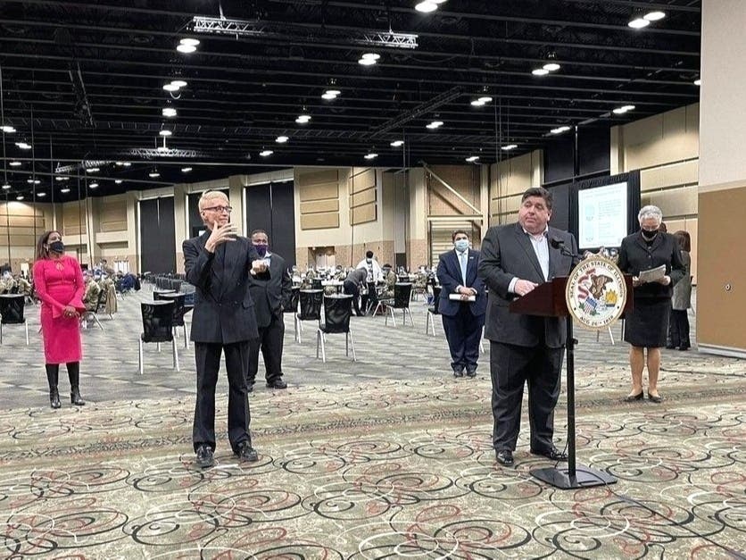 Gov. J.B. Pritzker appeared at the first mass vaccination site in suburban Cook County Monday in Tinley Park.