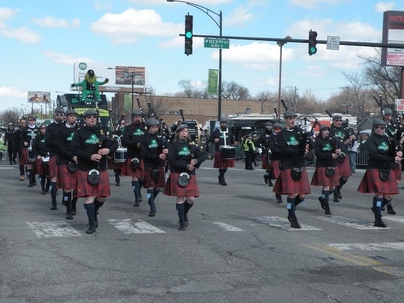 Bagpipers step down Western Avenue during the 2018 South Side Irish Parade.