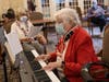 Marge Henry (on piano) with Alice Keame rehearse a sing-along for the fifth annual Valentine’s for Vets program.